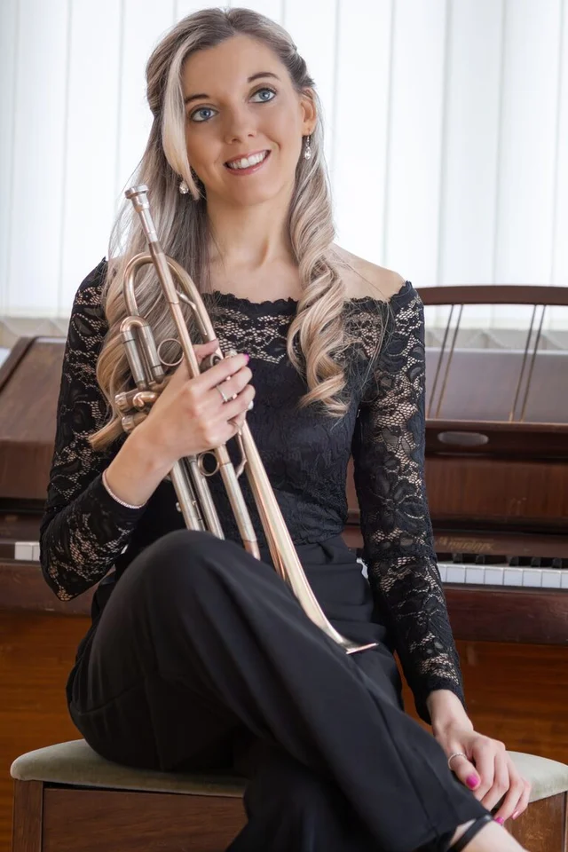 Jemma Andrews holding a trumpet